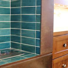Contemporary Turquoise Tile Fireplace in Modern Bathroom