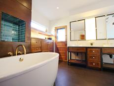 Large Modern Brown Bathroom With Metal and Wood Vanity and Soaking Tub