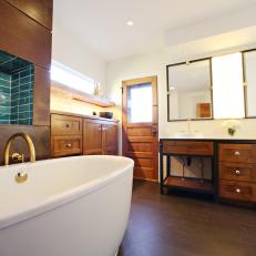 Large Modern Brown Bathroom With Metal and Wood Vanity and Soaking Tub
