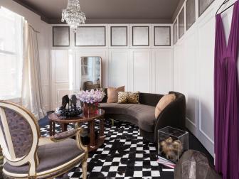 White Eclectic Sitting Room With Mirrored Panels and Velvet Sofa