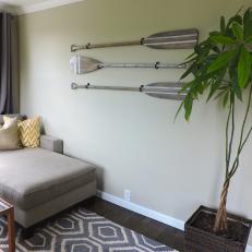 Antique Wooden Oars Used as Art in Neutral Living Space