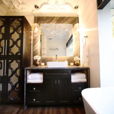 Sophisticated Bathroom With Mirrored Storage Cabinet