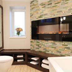 Cozy Master Bathroom With Custom Tiled Electric Fireplace