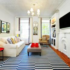 White Eclectic Living Room With Red Side Table