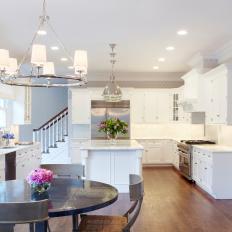 Neutral Transitional Eat-In Kitchen With White Cabinets