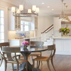 Neutral Transitional Kitchen Dining Area With Chandelier