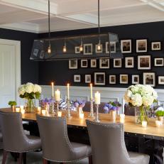 Contemporary Dining Room With Woodwork and Gallery Wall