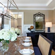 Neutral Transitional Dining Room With Wainscoting