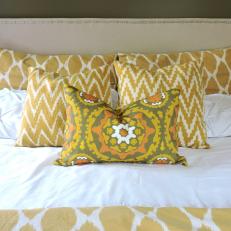 Stylish Yellow Patterned Pillows Energize Bedroom