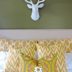 Faux Deer Head Adds Style to Transitional Olive Bedroom