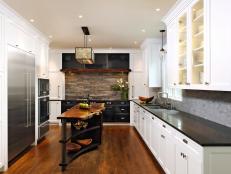 Kitchen With White Cabinets and Walnut Wood Island
