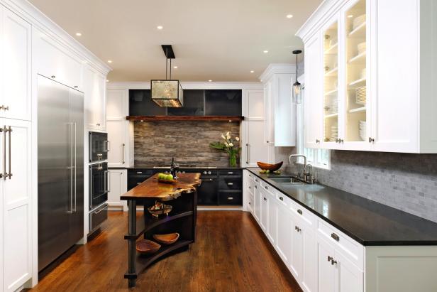 Kitchen With White Cabinets and Walnut Wood Island