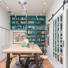 Eclectic Crafts Room With Turquoise Booksehlf