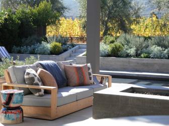 Contemporary Stone Patio With Outdoor Wood Seating