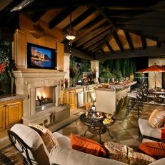 Outdoor Pavilion With Stone Fireplace and Vaulted Ceiling