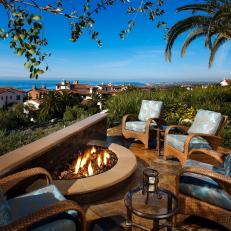 Outdoor Sitting Area With Fire Pit and Ocean View