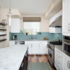 Marble-Topped Island in Transitional Kitchen