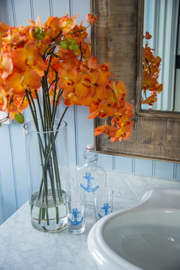 Orange Flowers On Guest Bathroom Counter Hgtv
