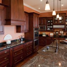 Orange Traditional Kitchen With Wood Cabinets