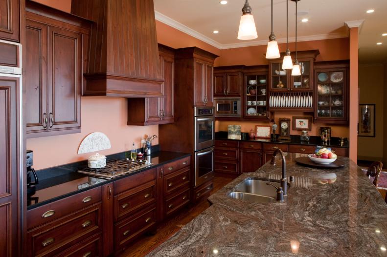Orange Traditional Kitchen With Wood Cabinetry