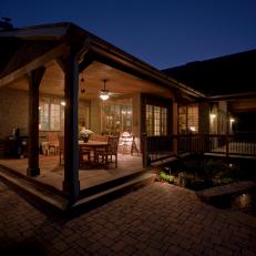 Home Exterior at Night With Lighted Porch
