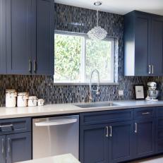 Blue Midcentury Modern Kitchen with Pental Quartz Backsplash