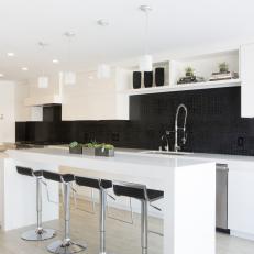 Black and White Modern Kitchen With Barstools