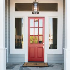 Bright Red Front Door With Exterior Pendant Light