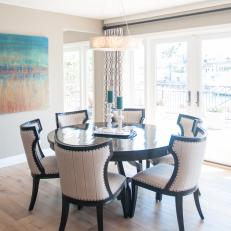 Dining Room With Black and Beige Contemporary Chairs