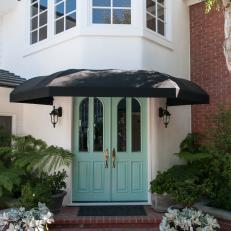 Mint Green Front Doors With White and Red Brick Exterior