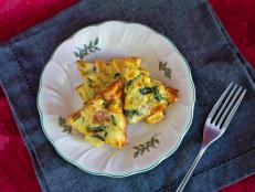 Make spinach frittatas in a Christmas tree shape as a festive, easy holiday breakfast idea for guests.
