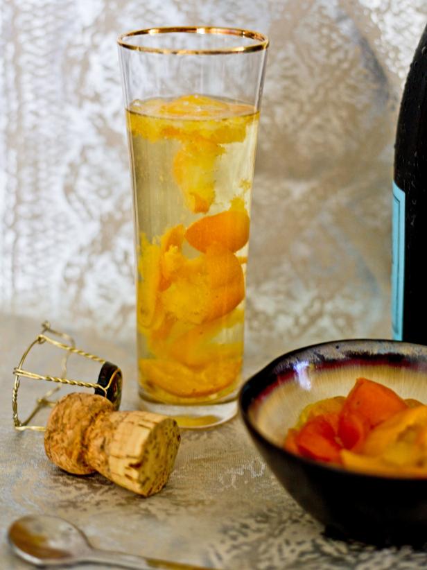 A kumquat-flavored bellini makes the perfect morning cocktail for overnight holiday guests.