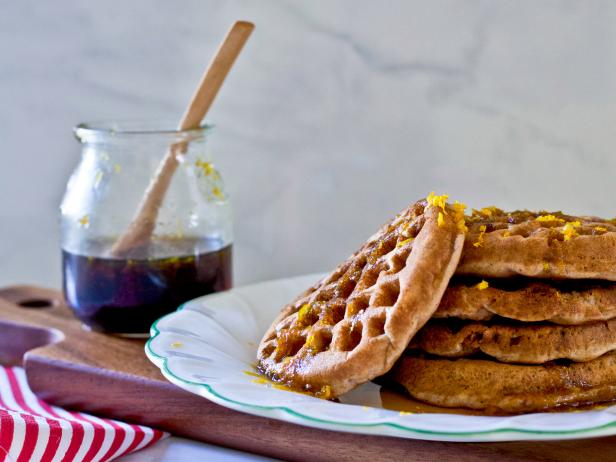 Orange-infused syrup makes these fluffy waffles a refreshing and delicious breakfast option for overnight holiday guests.