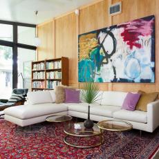 Colorful Transitional Family Room With Wood-Paneled Wall