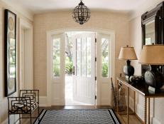 Neutral Tropical Entryway With Grasscloth Walls