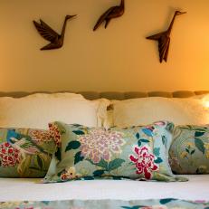 Mounted Metal Birds Above Bed With Chinoiserie Bedding