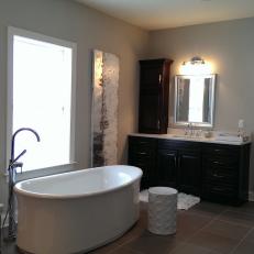 Contemporary Beige Bathroom With Chic Soaking Tub
