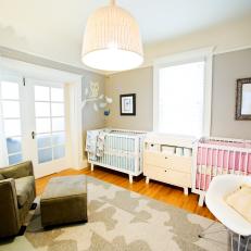 Modern Nursery For Two That's Cozy and Cool