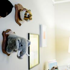 Modern Nursery Wall Decked With Adorable Stuffed Animal Decor