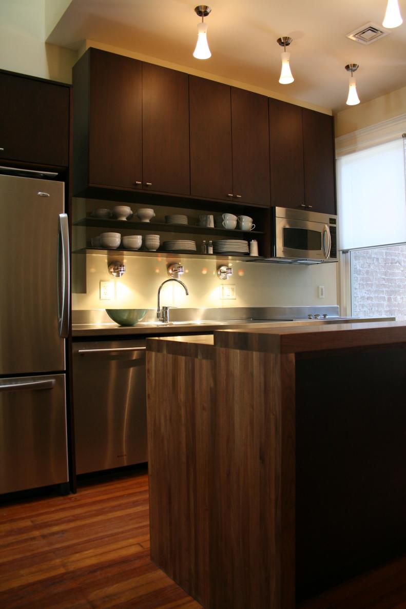 Contemporary Kitchen With Brown Wood Island and Dark Brown Cabinets