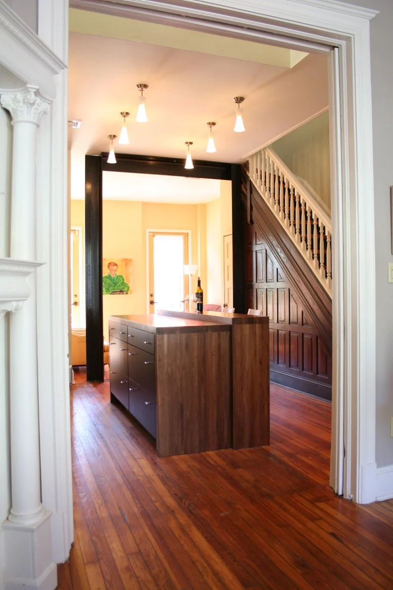 Transitional Kitchen With Brown Wood Island and Hardwood Floor