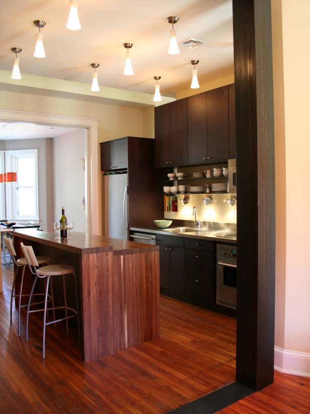 Contemporary Kitchen With Brown Wood Island and Espresso Wood Cabinets