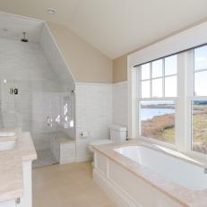 White Tile Master Bathroom with Shoreline Views