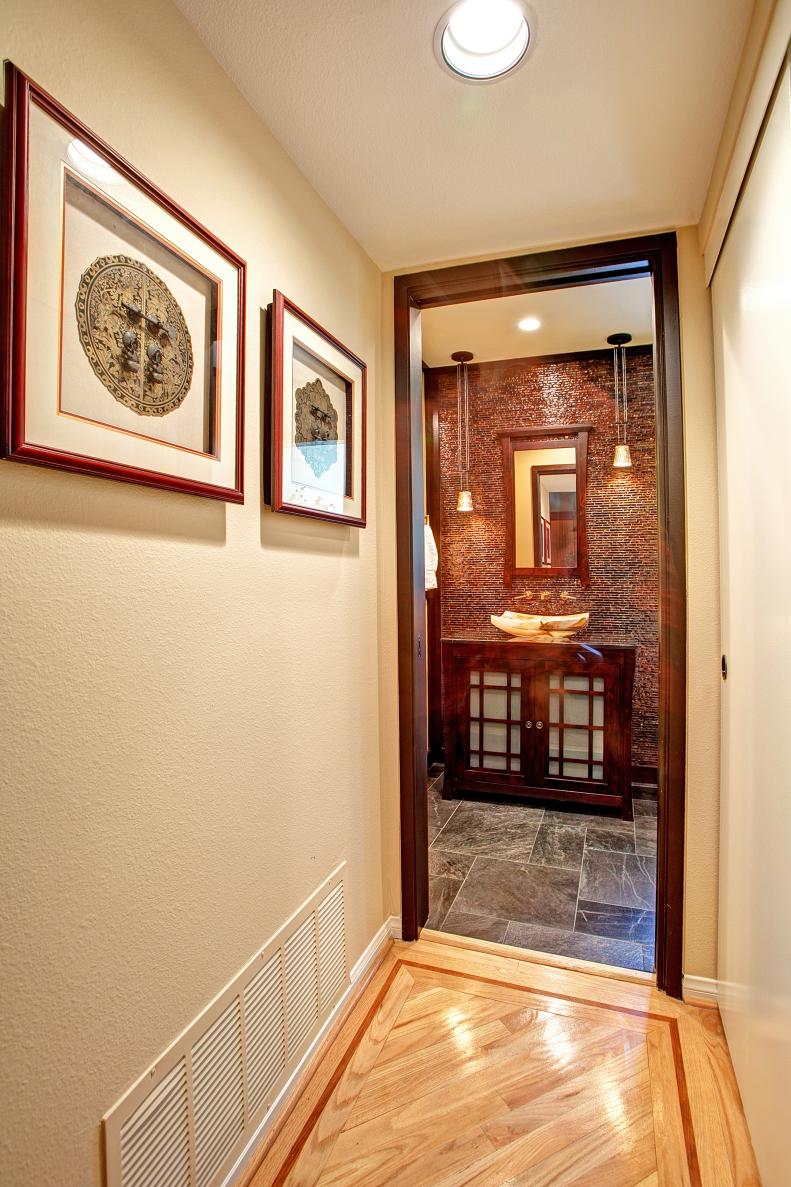 Small Neutral Hall Leads to Asian Bathroom