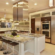Open Plan Kitchen With Gray and White Marble Island