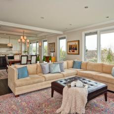 Bright and Open Family Room With Neutral Sectional