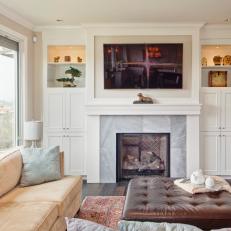 Bright and Open Living Room With Gray Marble Fireplace