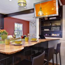 Bright Eclectic Kitchen With Island Seating and Green Pendant Lights