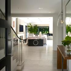Modern White Entryway Is Bright, Welcoming