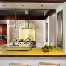 Free-Flowing Modern Kitchen With Yellow Countertop